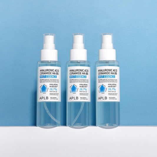 APLB ceramide and B5 moisture mist bottles arranged upright against a soft blue background