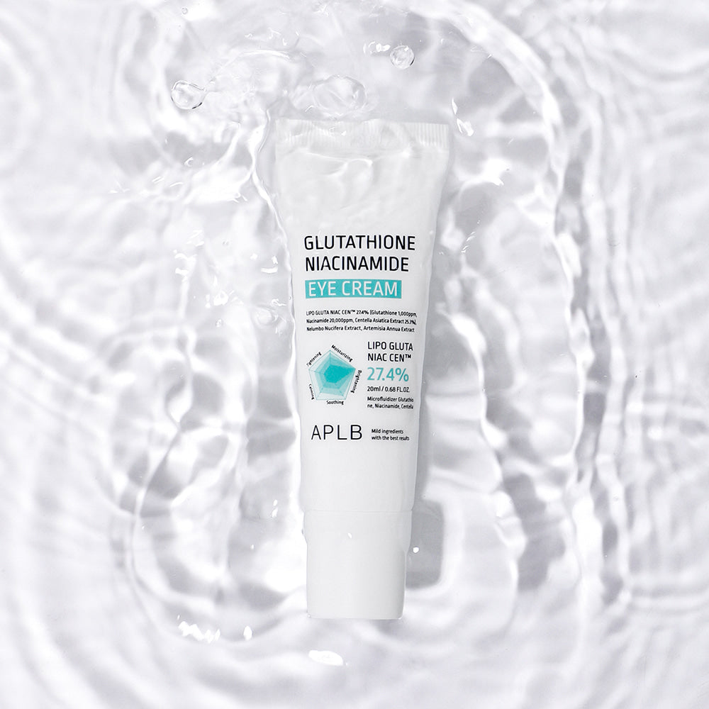 Two tubes of APLB Glutathione Niacinamide Eye Cream on a soft aqua background, lightweight K-beauty eye care designed to help brighten dull under-eyes and support smoother-looking skin.