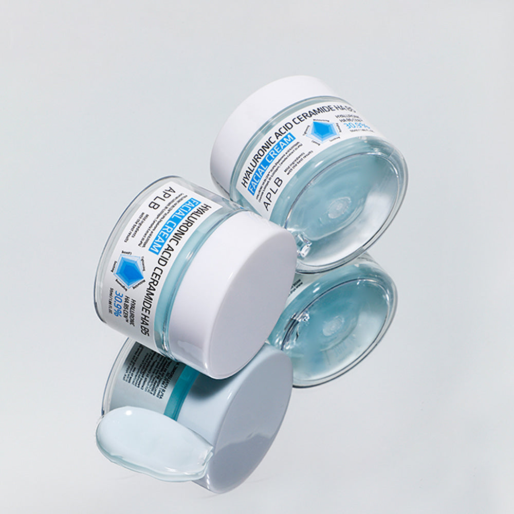 Stacked jars of APLB Hyaluronic Acid Ceramide HA B5 Facial Cream with a visible cream swatch
