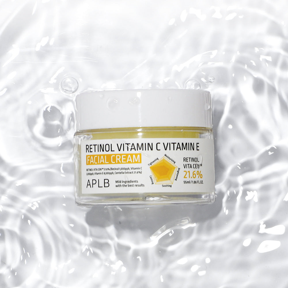 APLB Retinol Vitamin C Vitamin E Facial Cream surrounded by water ripples highlighting its hydrating formula with hyaluronic acid, squalane and soothing botanical extracts.