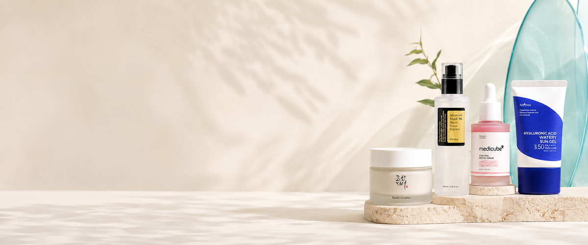 COSRX, Beauty of Joseon, Medicube and Isntree Korean skincare arranged in a bright editorial display at K-Beau.
